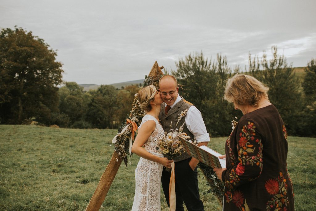 Hilltop ceremony with rustic and boho details