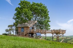 romantic treehouse in wales with hot tub
